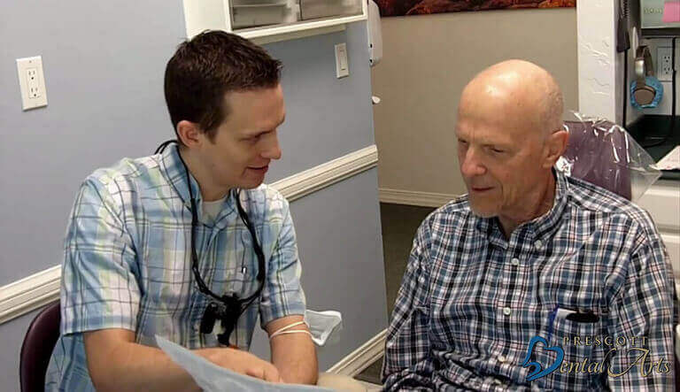 Dr. David Herbert with patient explaining the procedure