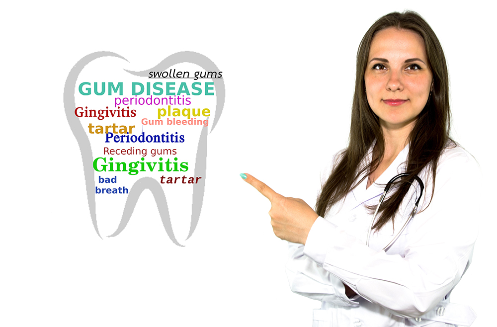 gum disease in a big tooth pointed by a lady dentist Prescott AZ