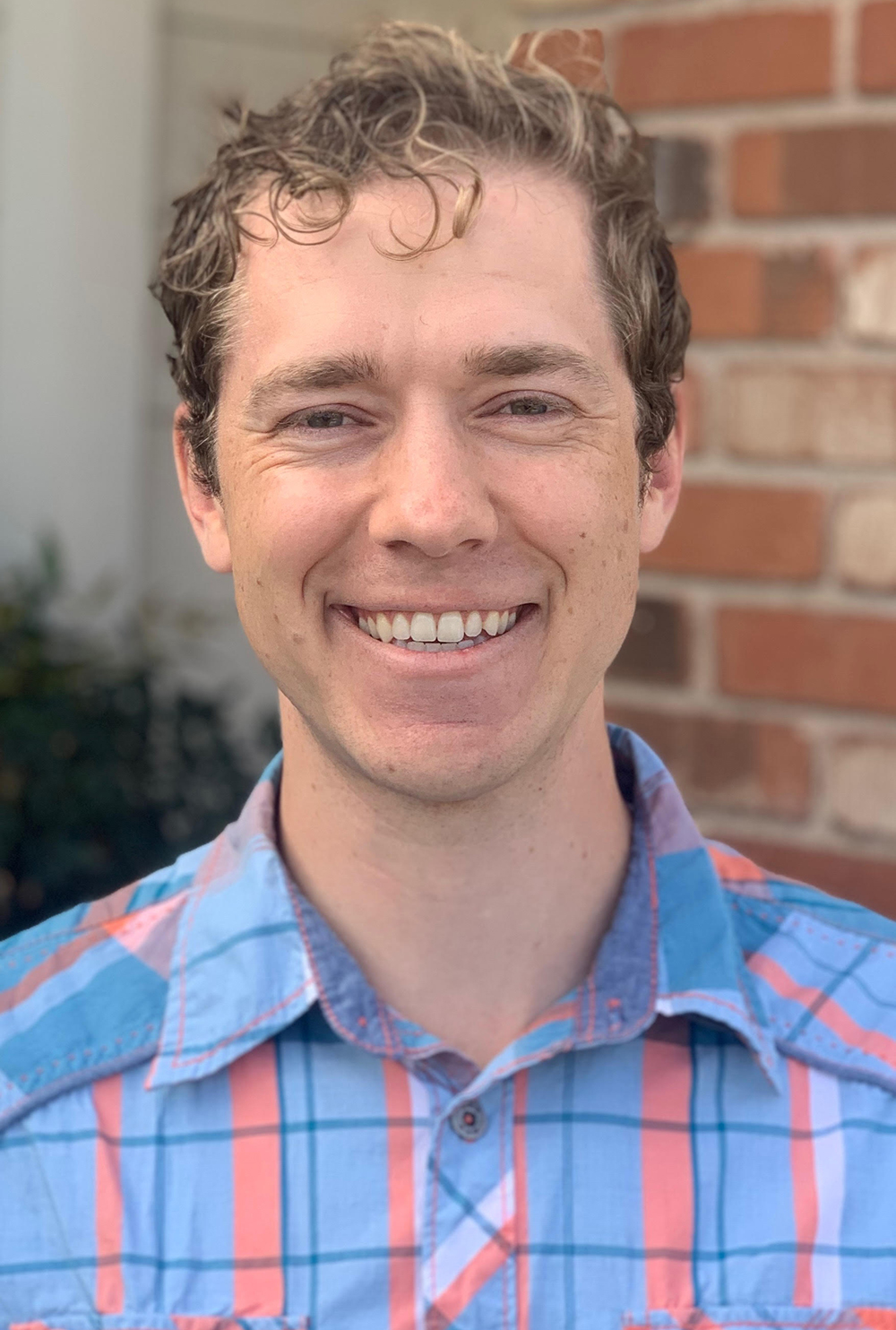 Dr. Nicholas Murray, Dentist Prescott Dr. Nicholas Murray, dentist at Prescott Dental Arts, smiling in a professional headshot outside the Prescott, AZ office